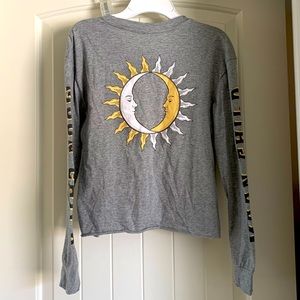 Long sleeve, XS, shirt. “Moon Child” on sleeves